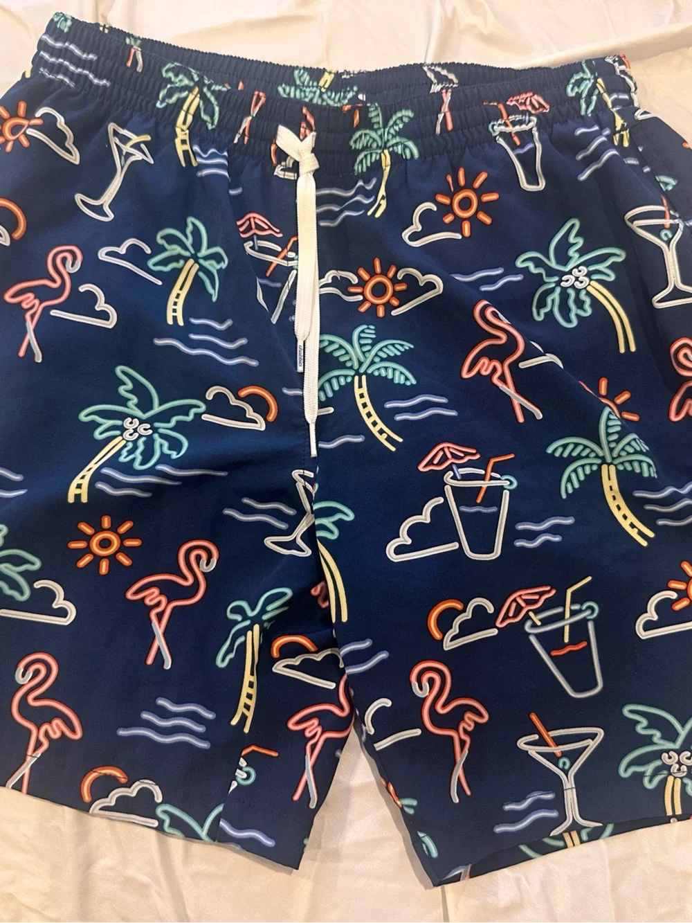 chubbies Navy Swim Trunks with Neon Tropical Icons